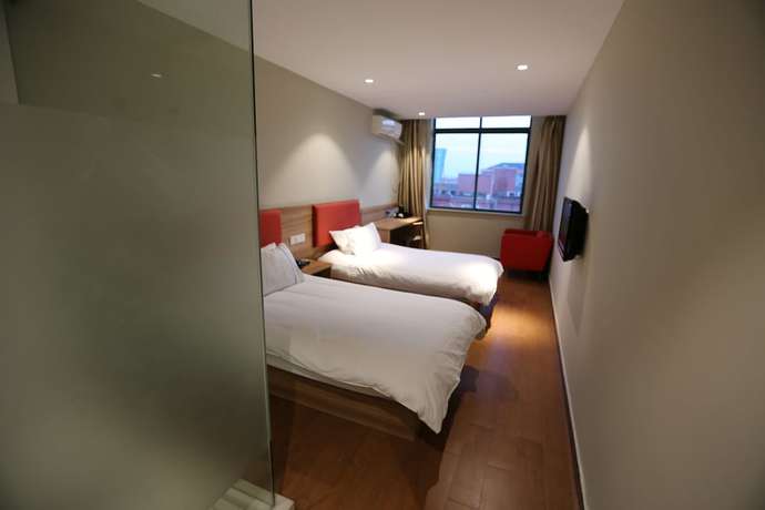 Imagen de la habitación del Hotel Shanghai xiannuo luxury hotel. Foto 4