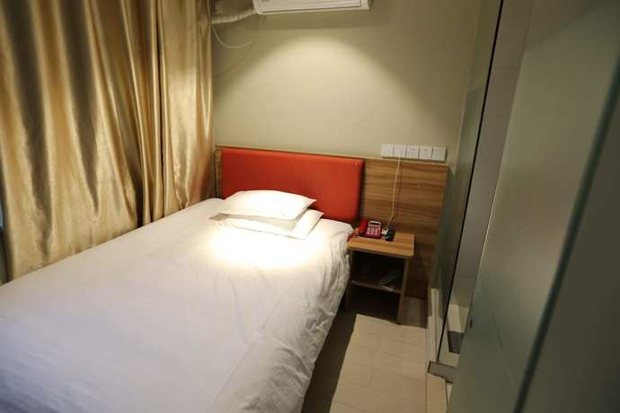 Imagen de la habitación del Hotel Shanghai xiannuo luxury hotel. Foto 5
