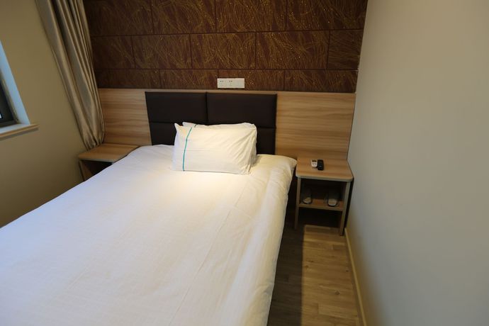 Imagen de la habitación del Hotel Shanghai xiannuo luxury hotel. Foto 9
