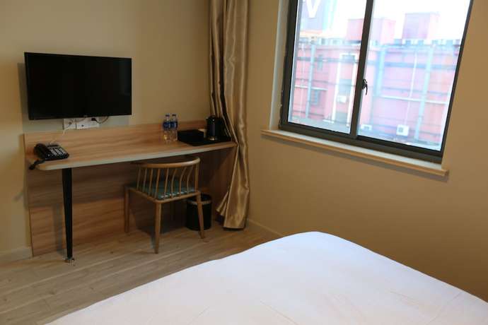 Imagen de la habitación del Hotel Shanghai xiannuo luxury hotel. Foto 11