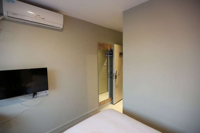 Imagen de la habitación del Hotel Shanghai xiannuo luxury hotel. Foto 12