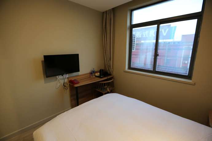 Imagen de la habitación del Hotel Shanghai xiannuo luxury hotel. Foto 13