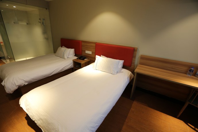 Imagen de la habitación del Hotel Shanghai xiannuo luxury hotel. Foto 14