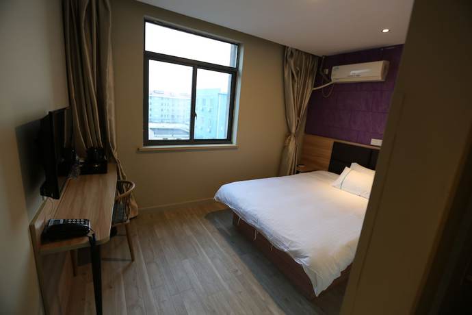 Imagen de la habitación del Hotel Shanghai xiannuo luxury hotel. Foto 16