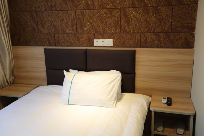 Imagen de la habitación del Hotel Shanghai xiannuo luxury hotel. Foto 17