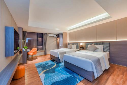 Imagen general del Hotel Shangpin Holiday Inn - Guangzhou New Baiyun International Airport Flagship Store. Foto 8