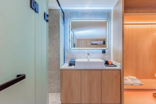 Imagen general del Hotel Shangpin Holiday Inn - Guangzhou New Baiyun International Airport Flagship Store. Foto 10