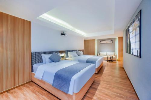 Imagen general del Hotel Shangpin Holiday Inn - Guangzhou New Baiyun International Airport Flagship Store. Foto 11