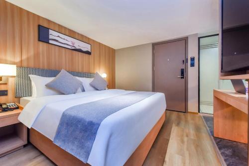 Imagen general del Hotel Shangpin Holiday Inn - Guangzhou New Baiyun International Airport Flagship Store. Foto 12