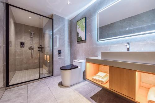 Imagen general del Hotel Shangpin Holiday Inn - Guangzhou New Baiyun International Airport Flagship Store. Foto 16