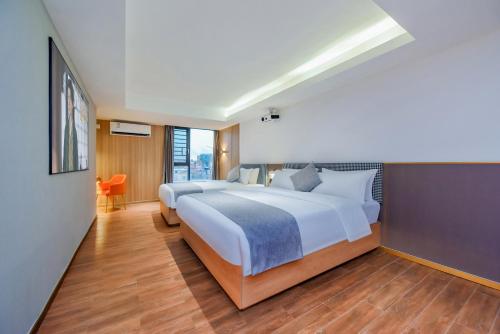 Imagen general del Hotel Shangpin Holiday Inn - Guangzhou New Baiyun International Airport Flagship Store. Foto 19