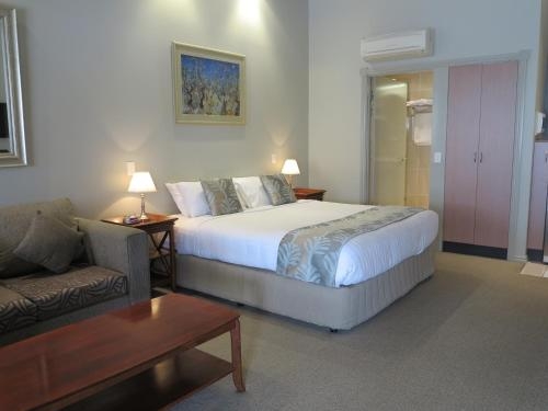 Imagen de la habitación del Hotel Shangri La Gardens. Foto 6