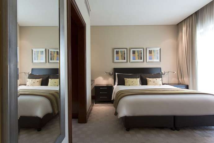 Imagen de la habitación del Hotel Shangri La Qaryat Al Beri. Foto 7