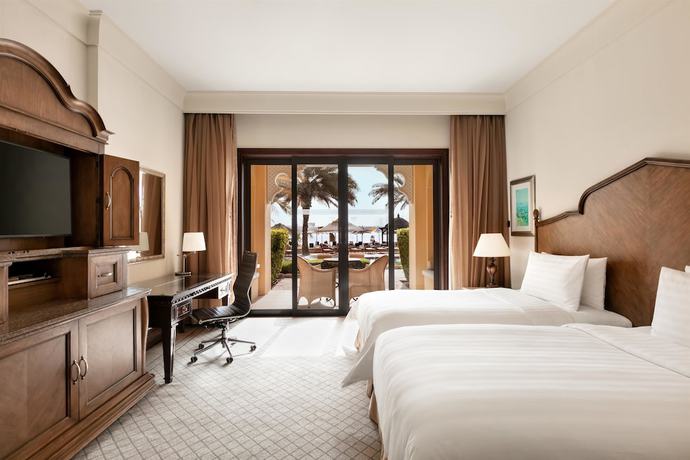 Imagen de la habitación del Hotel Shangri La Qaryat Al Beri. Foto 18