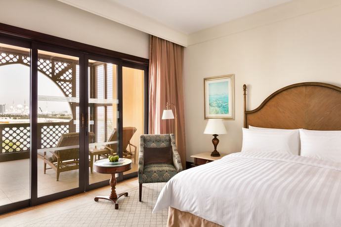 Imagen de la habitación del Hotel Shangri La Qaryat Al Beri. Foto 25