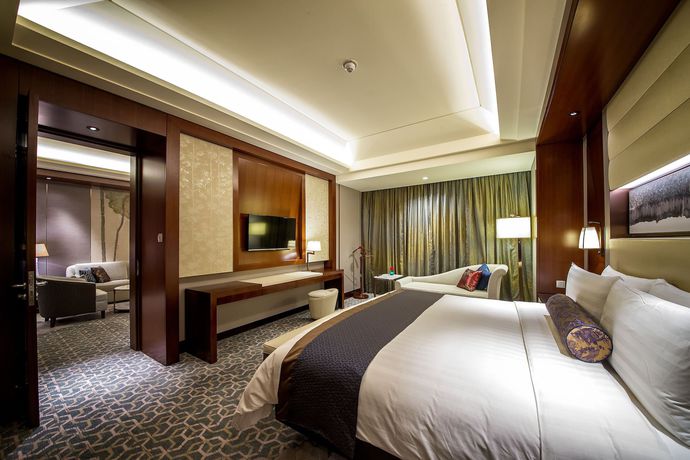 Imagen de la habitación del Hotel Shangri La, Tangshan. Foto 2