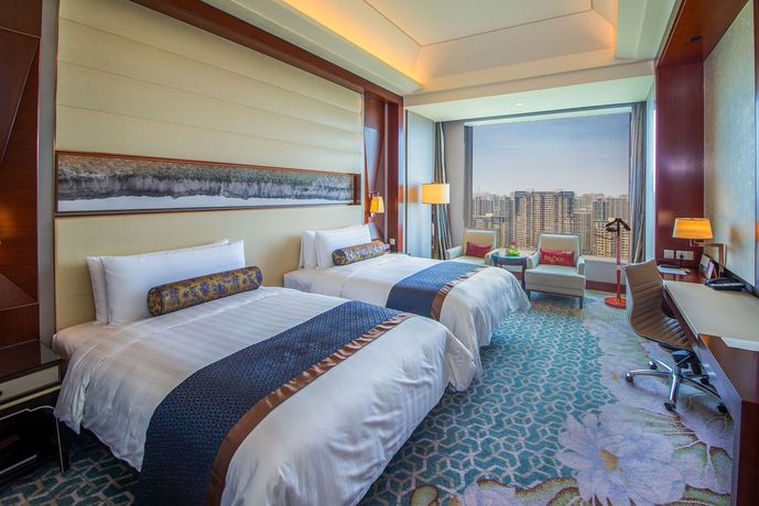 Imagen de la habitación del Hotel Shangri La, Tangshan. Foto 4