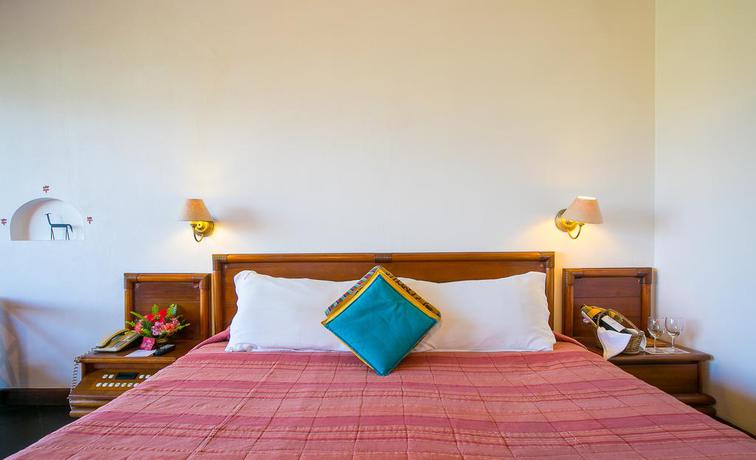 Imagen de la habitación del Hotel Shangri La Village Resort. Foto 6