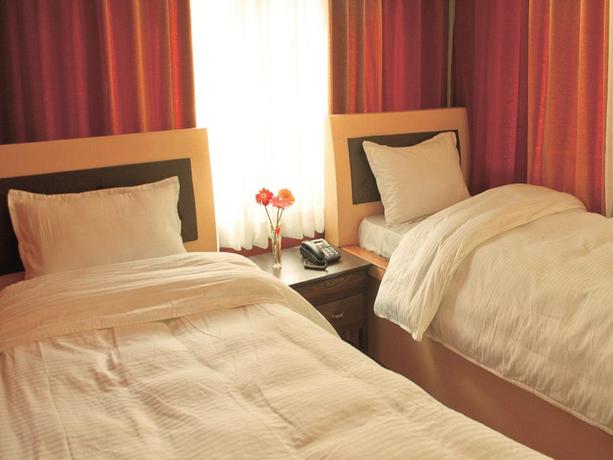 Imagen de la habitación del Hotel Shangri-la Boutique. Foto 8