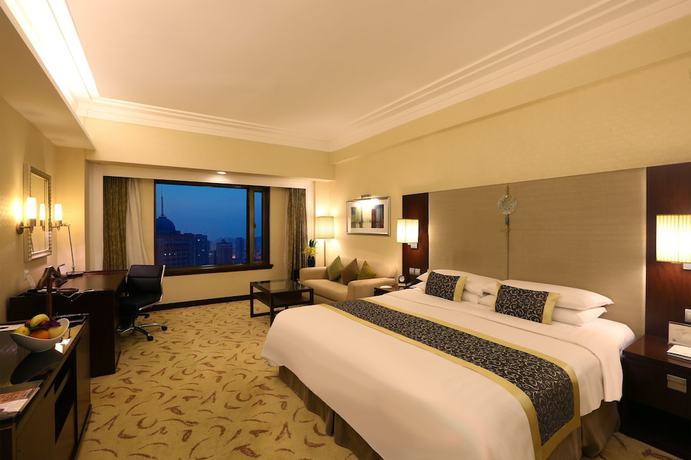 Imagen de la habitación del Hotel Shangri-la Dalian. Foto 2