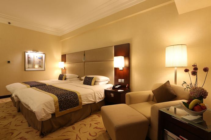 Imagen de la habitación del Hotel Shangri-la Dalian. Foto 3