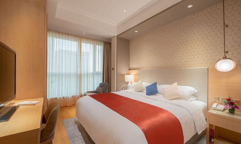 Imagen de la habitación del Hotel Shangri-la Dalian. Foto 5