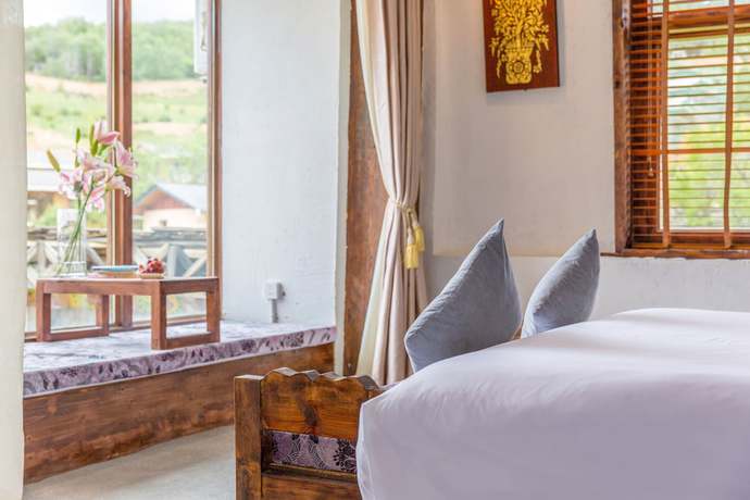 Imagen de la habitación del Hotel Shangri-la E-outfitting Boutique. Foto 12