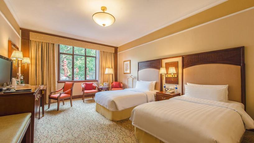 Imagen de la habitación del Hotel Shangri-la Hangzhou. Foto 5