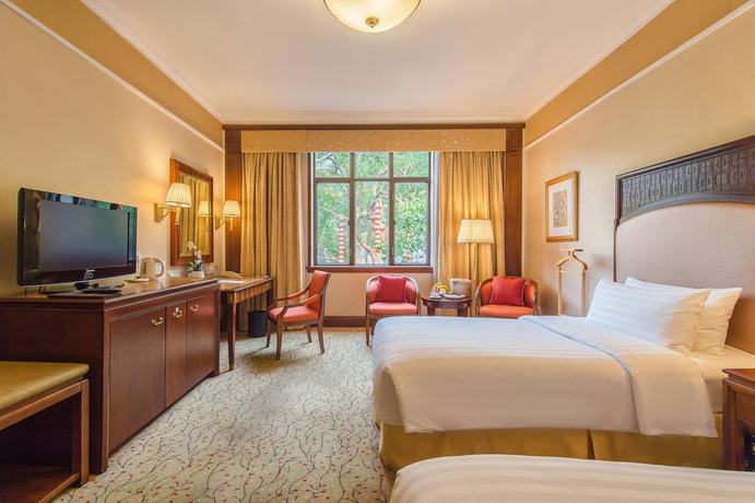 Imagen de la habitación del Hotel Shangri-la Hangzhou. Foto 6