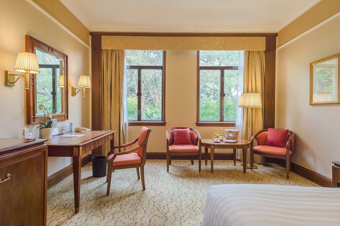 Imagen de la habitación del Hotel Shangri-la Hangzhou. Foto 7