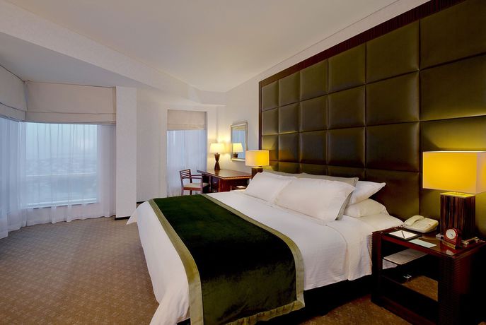 Imagen de la habitación del Hotel Shangri-la Hotel y Apartamentos Dubai. Foto 25