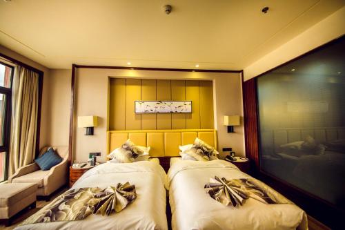 Imagen de la habitación del Hotel Shangri-la Moonlight International. Foto 4