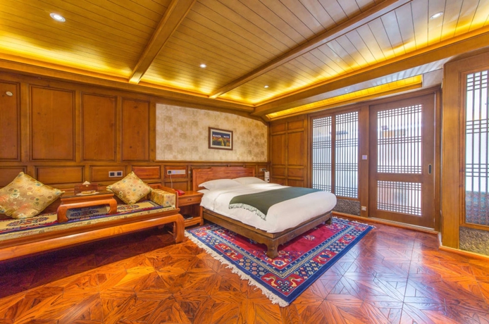 Imagen de la habitación del Hotel Shangrila Nan Ka Ming Dian Inn. Foto 10