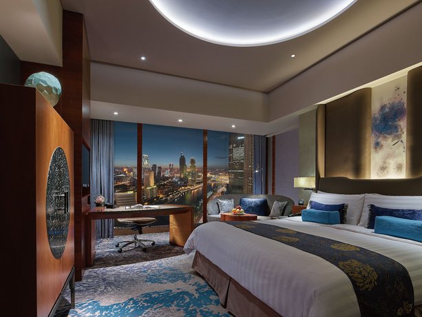 Imagen de la habitación del Hotel Shangri-la Tianjin. Foto 4