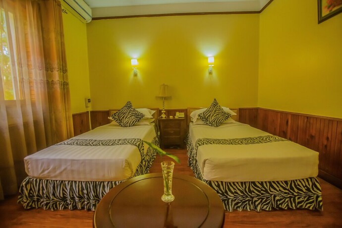 Imagen de la habitación del Hotel Shangri-la Uganda. Foto 20