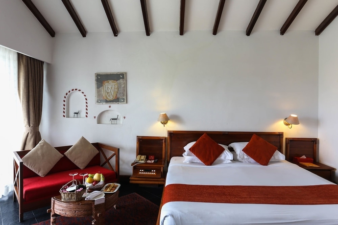 Imagen de la habitación del Hotel Shangri-la Village Resort. Foto 2