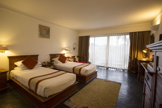 Imagen de la habitación del Hotel Shangri-la Village Resort. Foto 6