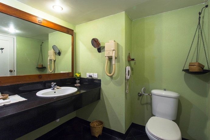 Imagen de la habitación del Hotel Shangri-la Village Resort. Foto 8