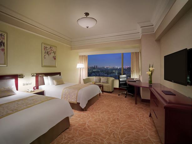 Imagen de la habitación del Hotel Shangri-la Wuhan. Foto 4