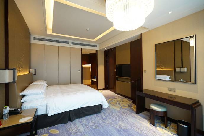 Imagen de la habitación del Hotel Shangri-la Yiwu. Foto 2