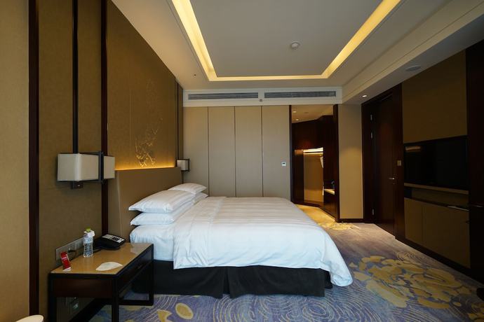 Imagen de la habitación del Hotel Shangri-la Yiwu. Foto 5