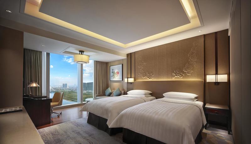Imagen de la habitación del Hotel Shangri-la Yiwu. Foto 6
