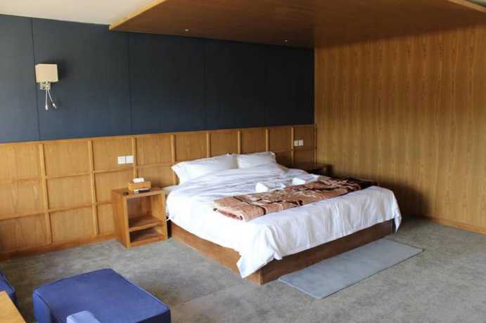 Imagen de la habitación del Hotel Shangri-la Youyou Inn. Foto 3