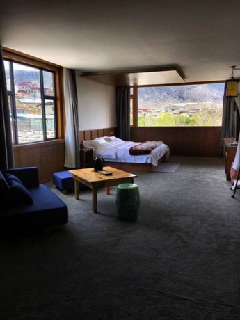 Imagen de la habitación del Hotel Shangri-la Youyou Inn. Foto 5