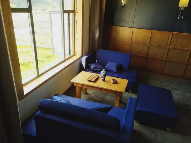 Imagen de la habitación del Hotel Shangri-la Youyou Inn. Foto 6