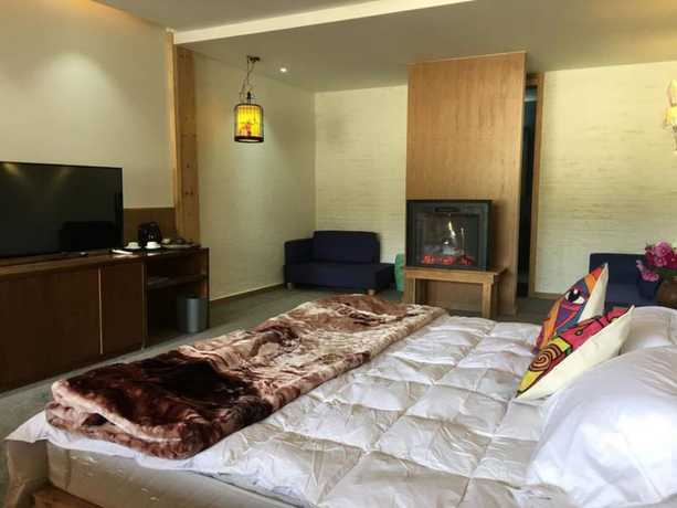 Imagen de la habitación del Hotel Shangri-la Youyou Inn. Foto 9