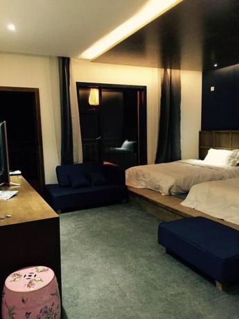 Imagen de la habitación del Hotel Shangri-la Youyou Inn. Foto 12
