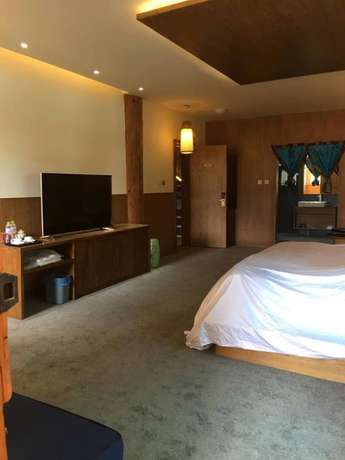 Imagen de la habitación del Hotel Shangri-la Youyou Inn. Foto 14
