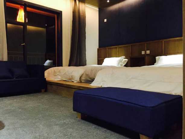 Imagen de la habitación del Hotel Shangri-la Youyou Inn. Foto 16