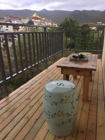 Imagen de la habitación del Hotel Shangri-la Youyou Inn. Foto 17